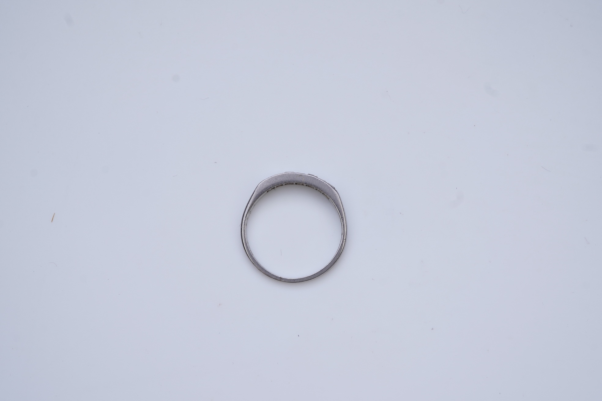 A diamond half-eternity ring, first half 20th century